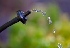 A drip irrigation system nozzle at high flow